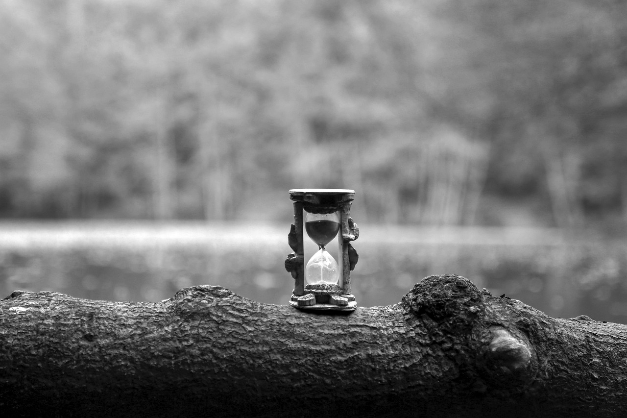 Hourglass symbolizing time and patience in testing